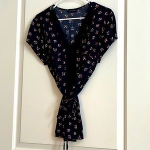 V-neck pin tuck blouse with optional tie belt